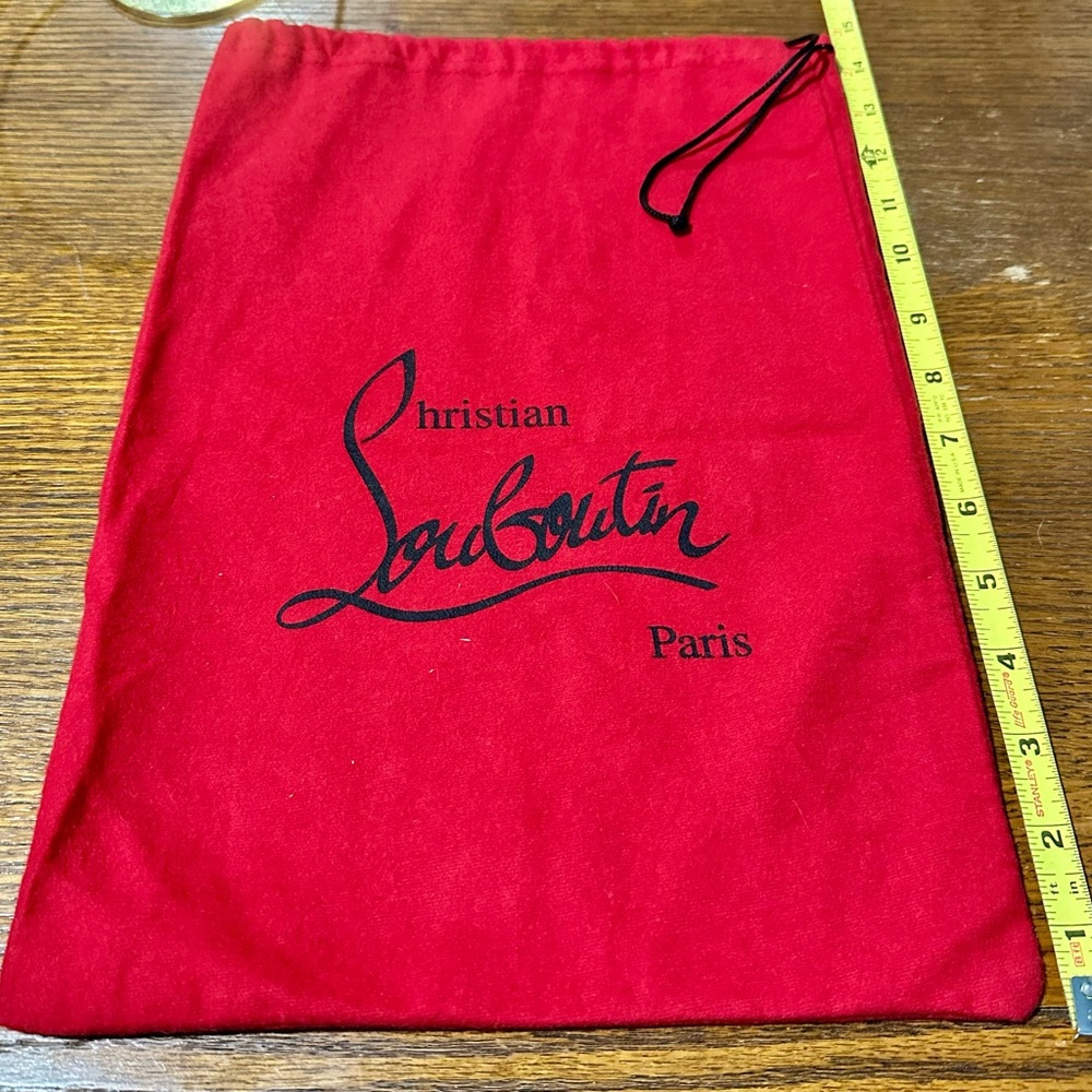 Louboutin dust bag.